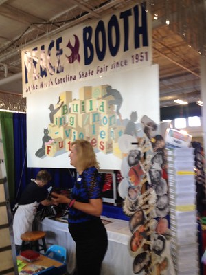 A WLPF volunteer at the 2019 Peace Booth